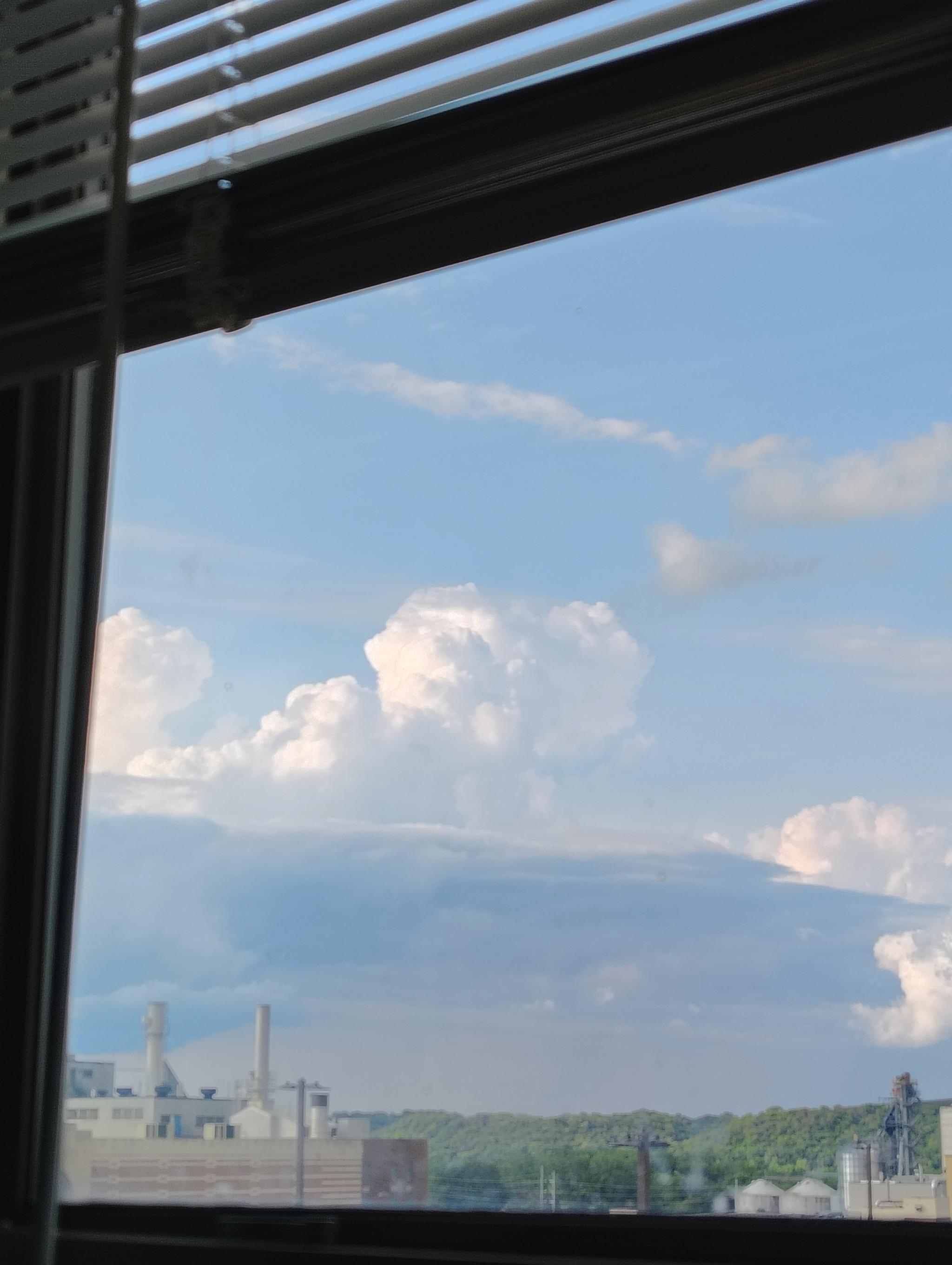 Clouds through a dirty window