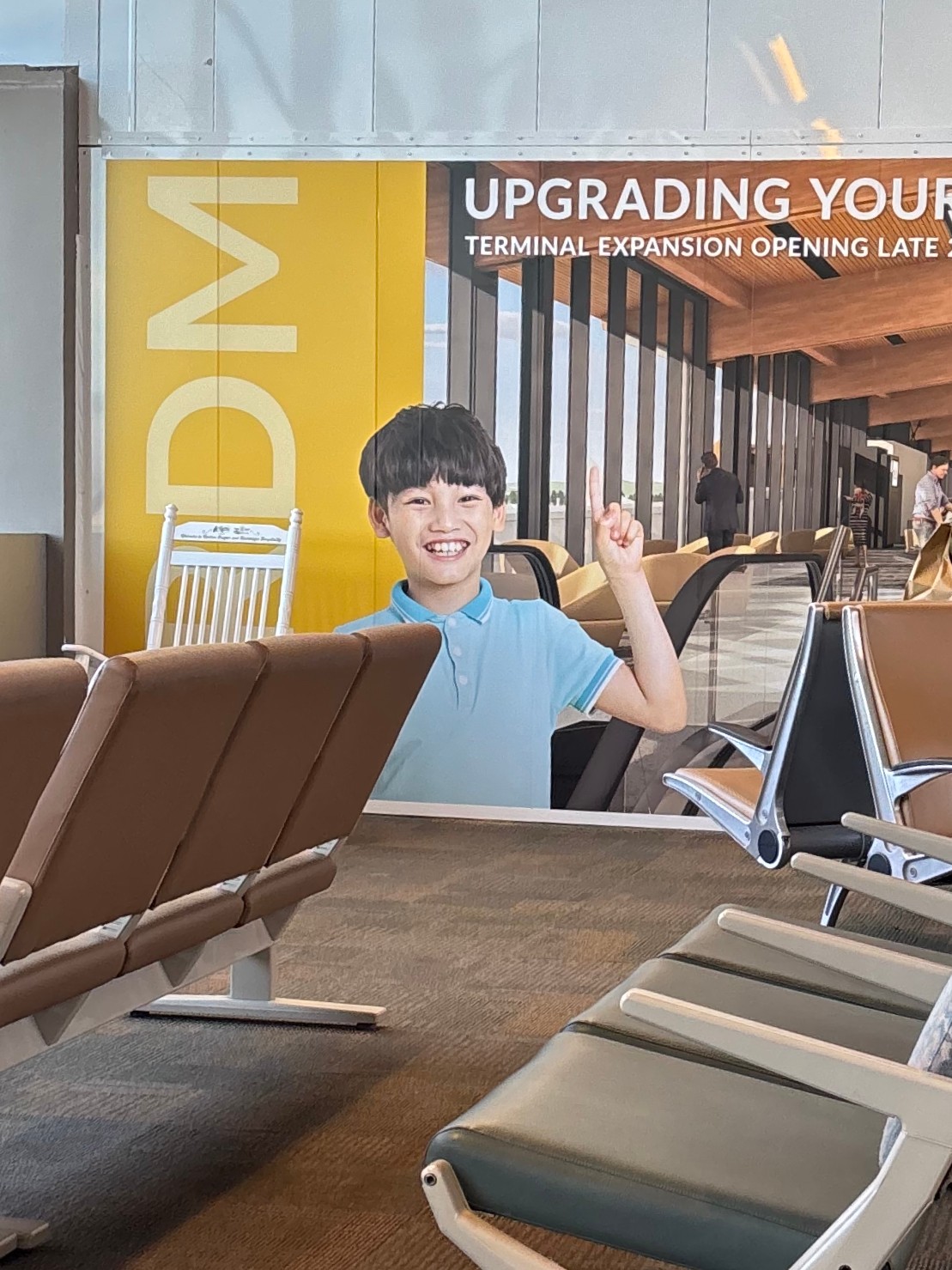 My trip to Chicago began with a sendoff from this well-intentioned, seemingly joyful boy pointing at nothing.